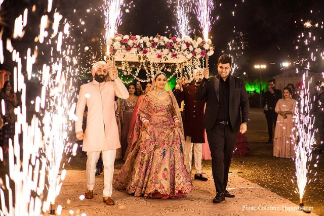 Bride and Groom Entry with Wedding Stage Decor